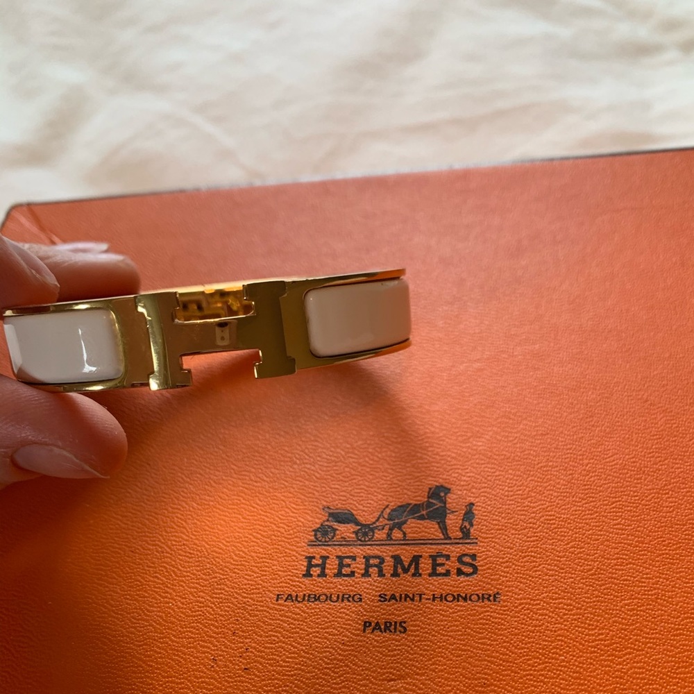 Hermès clic clac bracelet white and gold